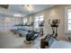 Gym featuring modern treadmills and elliptical machines with large windows at 352 Great Lawn Dr, Summerville, SC 29486