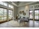 Stylish lobby with comfortable seating and views of the neighborhood at 352 Great Lawn Dr, Summerville, SC 29486