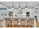 Modern kitchen with a large island, granite countertops, stainless steel appliances, and bar stool seating at 3736 Goodwater St, Mount Pleasant, SC 29466