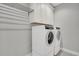 Convenient laundry room featuring updated white washer and dryer at 3736 Goodwater St, Mount Pleasant, SC 29466