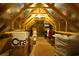 Spacious unfinished attic with wooden beams, perfect for storage or future expansion at 402 Switchgrass Dr, Summerville, SC 29486