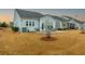 Fenced-in backyard with a patio area perfect for outdoor entertaining at 402 Switchgrass Dr, Summerville, SC 29486