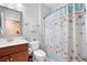 Cozy bathroom featuring a vanity and a shower with a decorative curtain at 402 Switchgrass Dr, Summerville, SC 29486