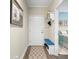 Inviting entryway featuring bench, decor, and view to blue accent wall in bedroom at 402 Switchgrass Dr, Summerville, SC 29486