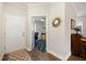 Entry way features wood floors, natural light, and view of the office at 402 Switchgrass Dr, Summerville, SC 29486