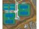 Overhead view of the tennis courts, showcasing the well-maintained green and blue courts and landscaped surroundings at 402 Switchgrass Dr, Summerville, SC 29486