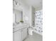 The bathroom features a white vanity, toilet, shower, and tub with bird-themed curtain at 46 Clearblue Loop, Summerville, SC 29486
