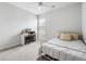This is a bedroom with light walls, a white bed and a desk with storage at 46 Clearblue Loop, Summerville, SC 29486