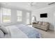 This is a spacious bedroom with a queen bed, a full length mirror and access to the outside at 46 Clearblue Loop, Summerville, SC 29486
