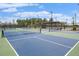 Community tennis courts with new nets, lighting, and fencing offer night and day recreation at 46 Clearblue Loop, Summerville, SC 29486