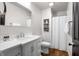 Bright bathroom featuring a modern single sink vanity and shower with a curtain at 461 Double Eagle Trce, Johns Island, SC 29455