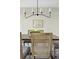 Dining room featuring seating for six with modern light fixture and elegant decor at 4993 Lake Palmetto, North Charleston, SC 29418