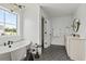 Bathroom featuring a soaking tub, dual vanities, and hexagonal tile flooring at 500 Eagleview Dr, Moncks Corner, SC 29461