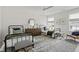 Charming bedroom featuring two twin beds, neutral colors, and bright natural light at 500 Eagleview Dr, Moncks Corner, SC 29461