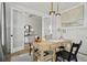 Bright home office showcasing a stylish desk, modern lighting, neutral tones and a view of the hallway at 500 Eagleview Dr, Moncks Corner, SC 29461