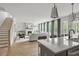 Open floor plan with modern kitchen with stainless steel appliances flowing into a spacious living room at 500 Eagleview Dr, Moncks Corner, SC 29461