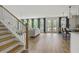 Spacious open-concept living room with hardwood floors and lots of natural light at 500 Eagleview Dr, Moncks Corner, SC 29461