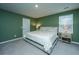 This bedroom has green walls, carpet, and a king bed at 500 Minim St, Charleston, SC 29414