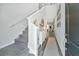 Entryway with stairway, carpeted stairs, coat rack and decor at 500 Minim St, Charleston, SC 29414