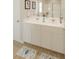 Bathroom with double sink vanity, bright lighting, decorative accents and modern fixtures at 5032 Scow Ct, Summerville, SC 29485