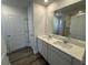 Modern bathroom featuring double sink vanity, framed mirror, and sleek fixtures at 5032 Scow Ct, Summerville, SC 29485