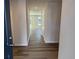 Open entryway featuring wood-look floors and neutral paint throughout the home at 5032 Scow Ct, Summerville, SC 29485