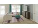 Inviting living room featuring a plush sectional sofa, a turquoise ottoman and a modern entertainment center at 5032 Scow Ct, Summerville, SC 29485