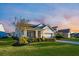 Beautiful home with manicured lawn and landscaped garden at 550 Tidewater Chase Ln, Summerville, SC 29486