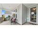 Inviting covered front porch with seating at 550 Tidewater Chase Ln, Summerville, SC 29486