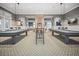 Spacious game room with pool tables, high top table, and inviting decor at 550 Tidewater Chase Ln, Summerville, SC 29486
