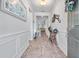 Inviting foyer with decorative lighting and hardwood floors at 550 Tidewater Chase Ln, Summerville, SC 29486