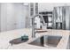 Kitchen island sink with marble countertops, stainless steel appliances, and white cabinetry at 550 Tidewater Chase Ln, Summerville, SC 29486