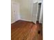 Bedroom featuring hardwood floors, closet and neutral walls at 56 Laurens St, Charleston, SC 29401