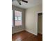 Bright bedroom featuring hardwood floors and a window with outside view at 56 Laurens St, Charleston, SC 29401
