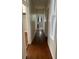 Hallway featuring hardwood flooring and views into other rooms at 56 Laurens St, Charleston, SC 29401