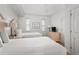 Comfortable bedroom with two beds, dresser, and ample natural light at 5800 Palmetto Dr # R-Vg102, Isle of Palms, SC 29451