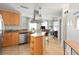 Bright kitchen features stainless steel appliances, granite countertops, and breakfast bar at 5800 Palmetto Dr # R-Vg102, Isle of Palms, SC 29451