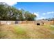 Expansive fenced backyard with play equipment, ideal for Gathering fun and outdoor games at 604 Red Mulberry Rd, Moncks Corner, SC 29461