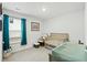 Bedroom room boasts natural light, neutral walls, and room for baby and parents alike at 604 Red Mulberry Rd, Moncks Corner, SC 29461