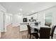 Cozy kitchen connected to a dining area with a lovely window that offers tons of natural light at 604 Red Mulberry Rd, Moncks Corner, SC 29461