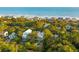 Beautiful coastal homes nestled between lush trees with direct beach access at 608 W Beach Ct, Folly Beach, SC 29439