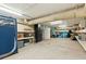 Unfinished basement space with built-in shelving and ample storage options at 608 W Beach Ct, Folly Beach, SC 29439