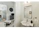 Bathroom featuring single sink vanity with modern fixtures at 608 W Beach Ct, Folly Beach, SC 29439