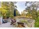 Inviting outdoor deck with seating, offering picturesque views of nature and tranquil surroundings at 608 W Beach Ct, Folly Beach, SC 29439