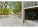 Golf cart garage with a charming green cart inside at 608 W Beach Ct, Folly Beach, SC 29439