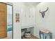Hallway with stylish decor elements and a natural wood sliding barn door at 608 W Beach Ct, Folly Beach, SC 29439