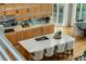 Gourmet kitchen with island and quartz countertop with lots of cabinet and countertop space at 608 W Beach Ct, Folly Beach, SC 29439