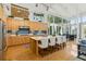 Modern kitchen with sleek countertops, stainless steel appliances, and an island with seating, ideal for gatherings at 608 W Beach Ct, Folly Beach, SC 29439