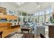 Expansive living area featuring soaring ceilings, abundant natural light, and an open layout perfect for entertaining at 608 W Beach Ct, Folly Beach, SC 29439