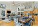 Spacious living room with fireplace, hardwood floors, and open layout perfect for entertaining at 608 W Beach Ct, Folly Beach, SC 29439